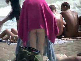 Nude teenage girl wrapped in a towel