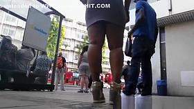 Ebony woman in mini dress