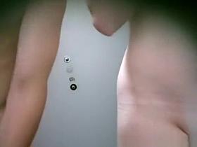 Couple spied in pool cabin dressing