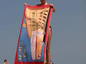 Amazing topless girl at a beach
