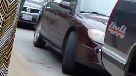 Sexy babe walks by a construction yard