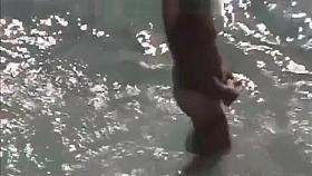 secret voyeur in the water at beach