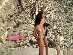 Guy takes pictures of hot brunette nudist