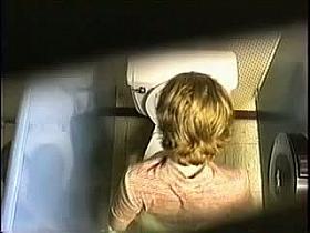 Cute girl in short little shorts shot on spy cam in toilet