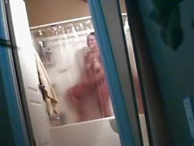 Chubby amateur gets clean in voyeur shower video