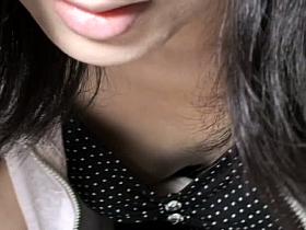 Mature Asian shows her small tits in this cleavage spy shot