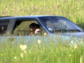 Horny couple caught fucking inside car