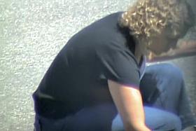 Big blonde babe leans forward and demonstrates downblouse