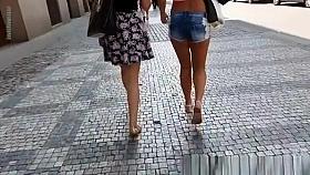 View of beautiful girls ass in tight shorts.