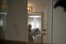 Peeped mother steps out of a shower