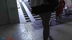 Agreeable upskirt beauty in beige coat