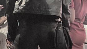 Candid Ebony ass in leather shorts