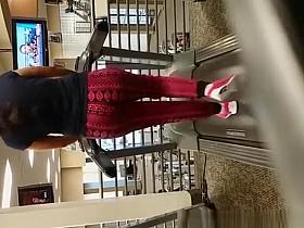 Big ass in sports pants walking