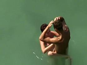 Big dick nude man fucks naked woman in water