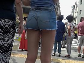 Smoking hot brunette gets her big butt caught on tape