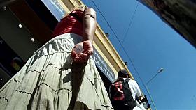 Glamorous blonde in long skirt waiting for somebody