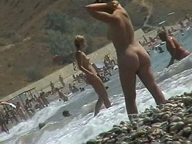 Naked mature babe caught by nude beach voyeur