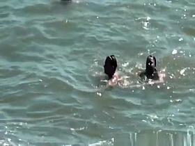 Nudist women in the water