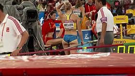 Sexy sportswoman with a big butt does pole vaulting
