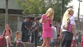 Tight asses are caught upskirt on camera