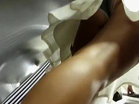 Perfect ass under a short skirt