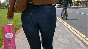 Candid ass in tight jeans tan leather jacket