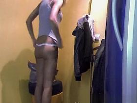 Two shaved pussy gals caught in tanning room