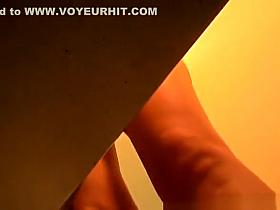 Girl spied in pool cabin changing