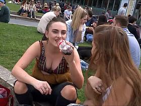 Busty girl smiles and waves at me