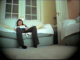 Young cutie watching tv and masturbating hot beaver