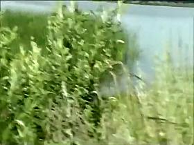 Teen girl spied as she swims in a lake