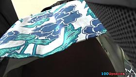 Busty MILF with tasty ass in the upskirting scene