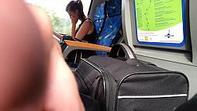 Blonde girl reads and ignores in train