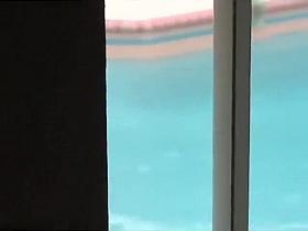 She reads a book and swims naked