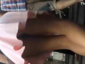 Voyeur peeps on appealing girl's skirt