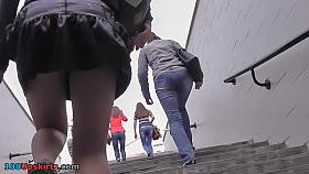 Delightsome upskirt gal clothed in dark