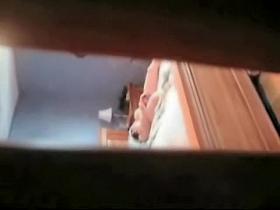 Spy cam sex video with doll dildo fucking nub on the bed