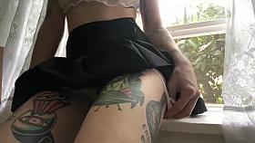 upskirt pussy tease next to open window