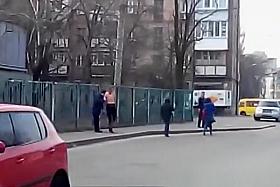 Topless on the street.