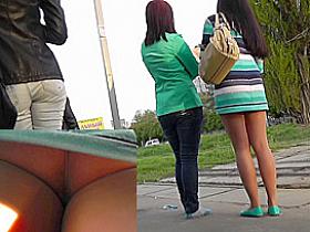 Brunette babe caught on the upskirt camera outdoors