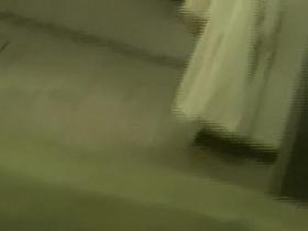 Girl shows her round titties to the window voyeurer