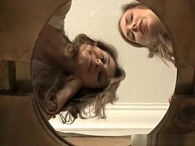 Two pretty chicks pissing