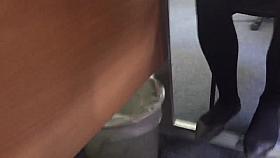 Attempting upskirt at work