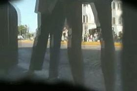 Hot blonde in a voyeur upskirt thong video