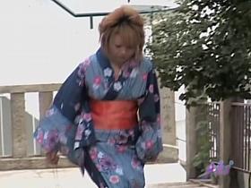 Amiable Japanese sweetie flashes her tits when someone grabs her outfit