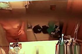 Asian woman caught in bathroom