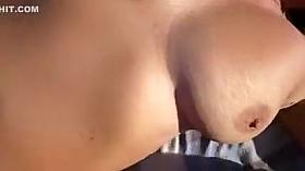 Cumshot on Big Tits at the Beach