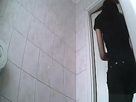 Cute chick peeing in toilet