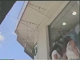 Sweet chick in pink skirt captured on upskirt video on the street