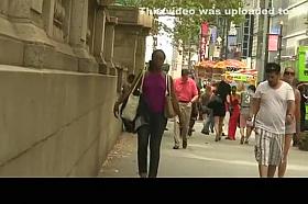 Ebony girl in purple top wearing no bra